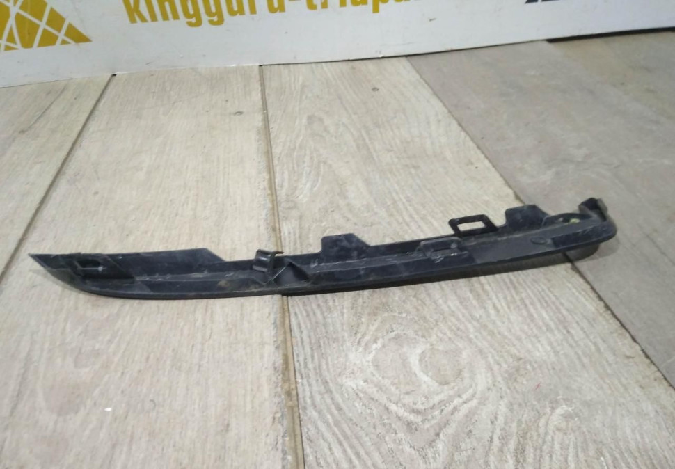 Вставка под фару левая бу Renault Logan 2 OEM 260947178R Вставка под фару левая бу Renault Logan 2 OEM 260947178R