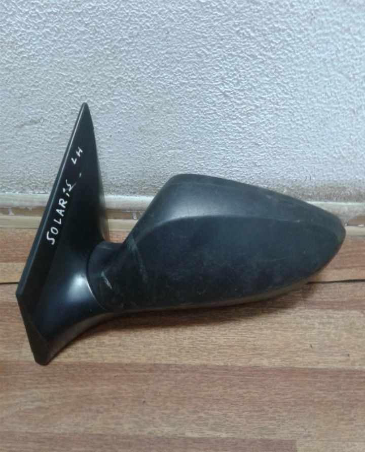 Зеркало левое Hyundai Solaris 1 (слом. часть)