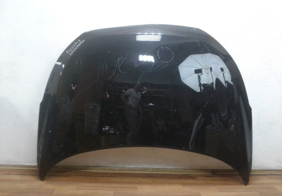 Капот Hyundai Tucson 3 (15>) oem 66400D7000 (вмятины)