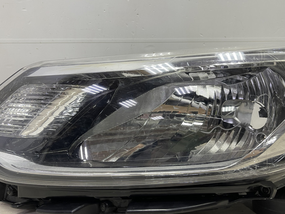 Фара левая Kia Rio 3 рестайлинг 2015 OEM 921014X501 Фара левая Kia Rio 3 рестайлинг 2015 OEM 921014X501