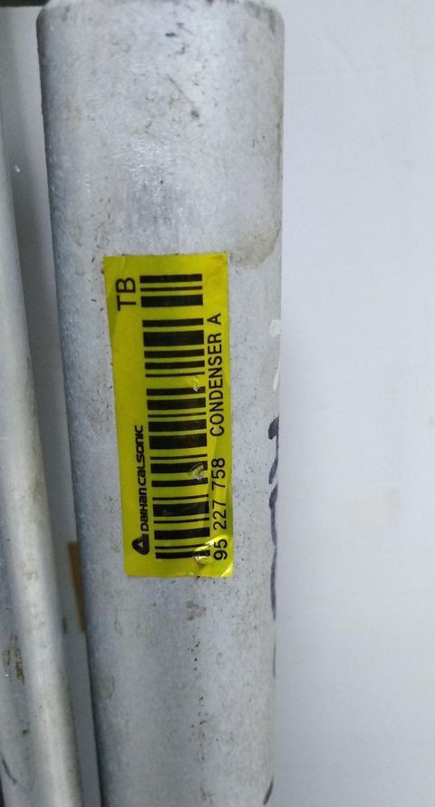 Радиатор кондиционера Chevrolet Aaveo T250 2005-2011 1.4L oem 95227758 Радиатор кондиционера Chevrolet Aaveo T250 2005-2011 1.4L oem 95227758