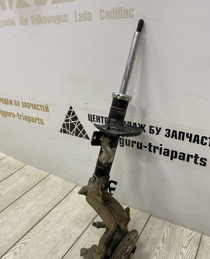 Амортизатор передний с левом кулаком Skoda Rapid OEM 6R0413031BF