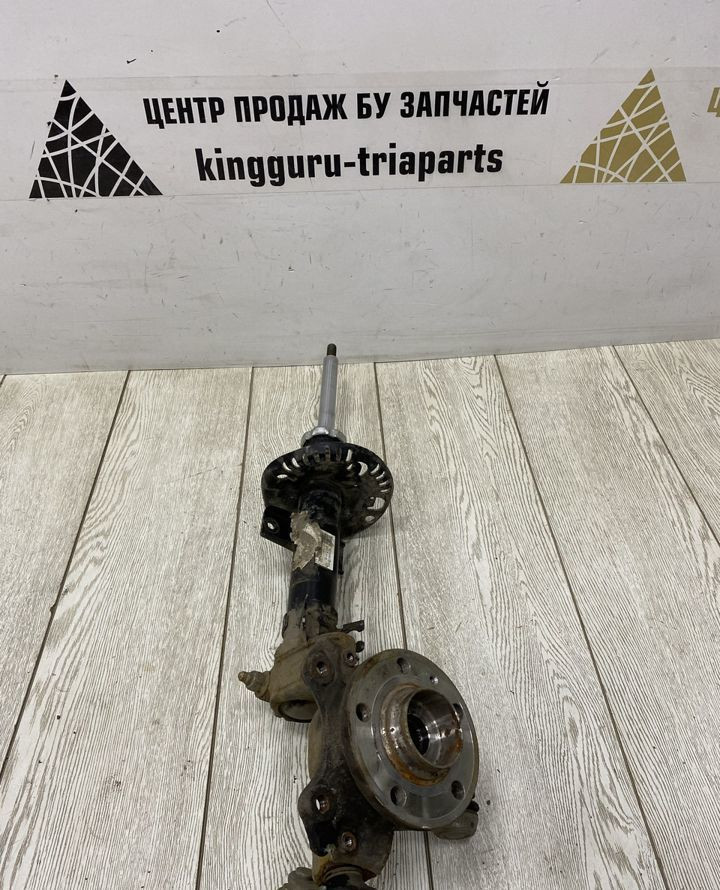 Амортизатор передний с левом кулаком Skoda Rapid OEM 6R0413031BF