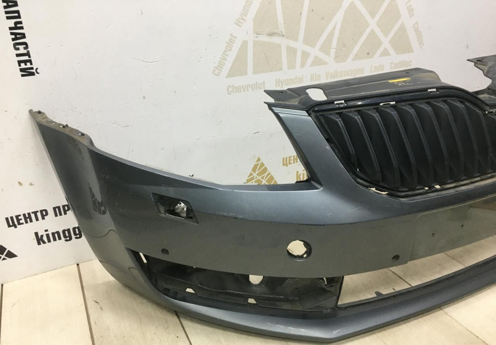 Бампер передний Skoda Octavia A7 до рестайлинг 2013  OEM 5E0807221