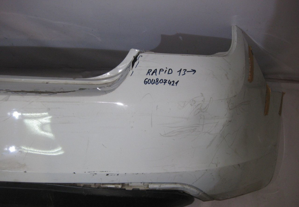 Бампер задний Skoda Rapid OEM 60U807421(трещины) (скл-3) Бампер задний Skoda Rapid OEM 60U807421(трещины) (скл-3)