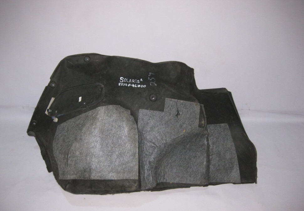 Обивка багажника правая Hyundai Solaris 1 oem 857404L000 Обивка багажника правая Hyundai Solaris 1 oem 857404L000