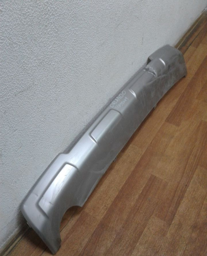 Накладка заднего бампера Chevrolet Orlando oem 96895649 (вмятина) (скл-3)