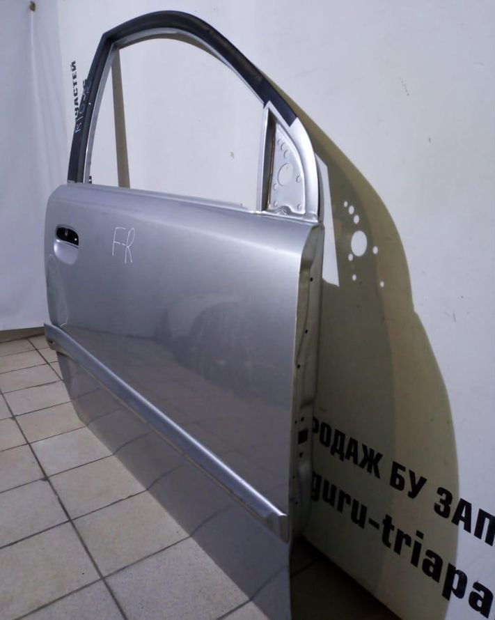 Дверь передняя правая Kia Rio 2 05-11 oem 760041G010 (ско-3) Дверь передняя правая Kia Rio 2 05-11 oem 760041G010 (ско-3)