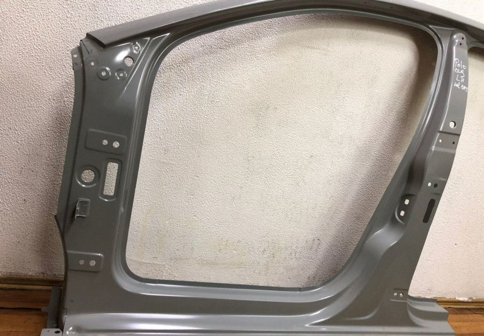 Боковина левая Volkswagen Polo 09- седан (нов. ориг)