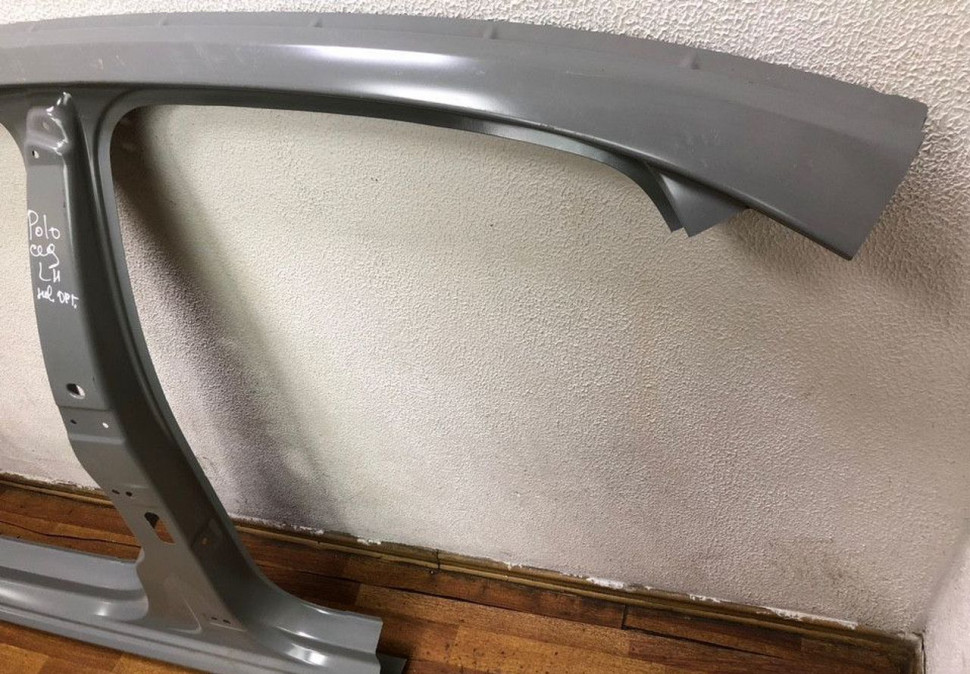 Боковина левая Volkswagen Polo 09- седан (нов. ориг)