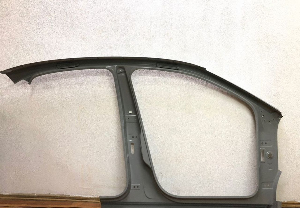 Боковина левая Volkswagen Polo 09- седан (нов. ориг)