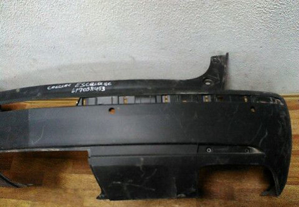 Бампер задний Cadillac Escalade с левым клыком oem 617058453 (Скл-3)