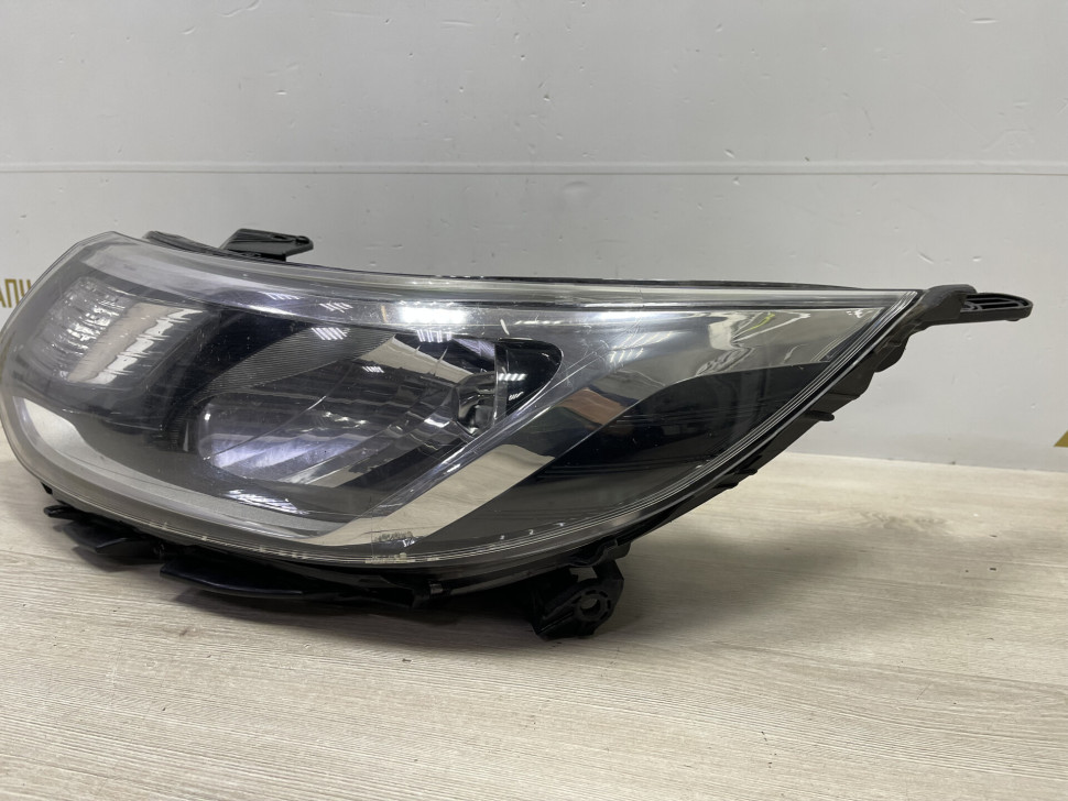 Фара левая Kia Rio 3 рестайлинг 2015 OEM 921014X500 Фара левая Kia Rio 3 рестайлинг 2015 OEM 921014X500