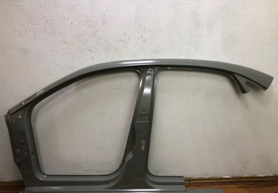 Боковина левая Volkswagen Polo 09- седан (нов. ориг)