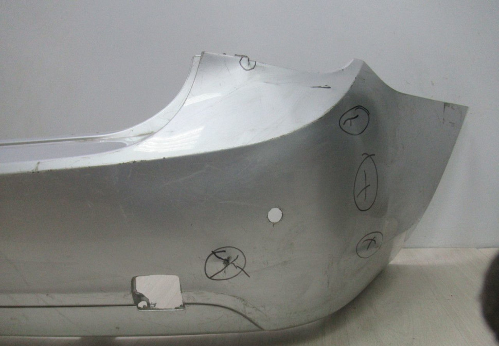 Бампер задний Chevrolet Cruze до рестайлинг  OEM 95479270 (вмятины) (мал.трещ) (скл-3)