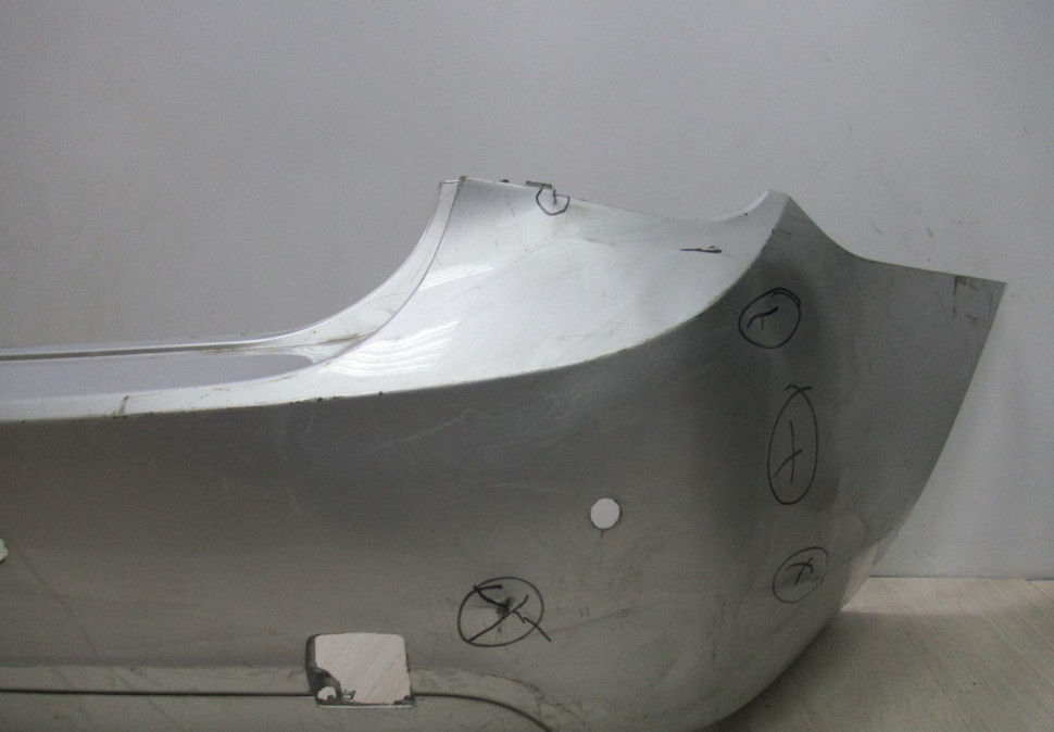 Бампер задний Chevrolet Cruze до рестайлинг  OEM 95479270 (вмятины) (мал.трещ) (скл-3)