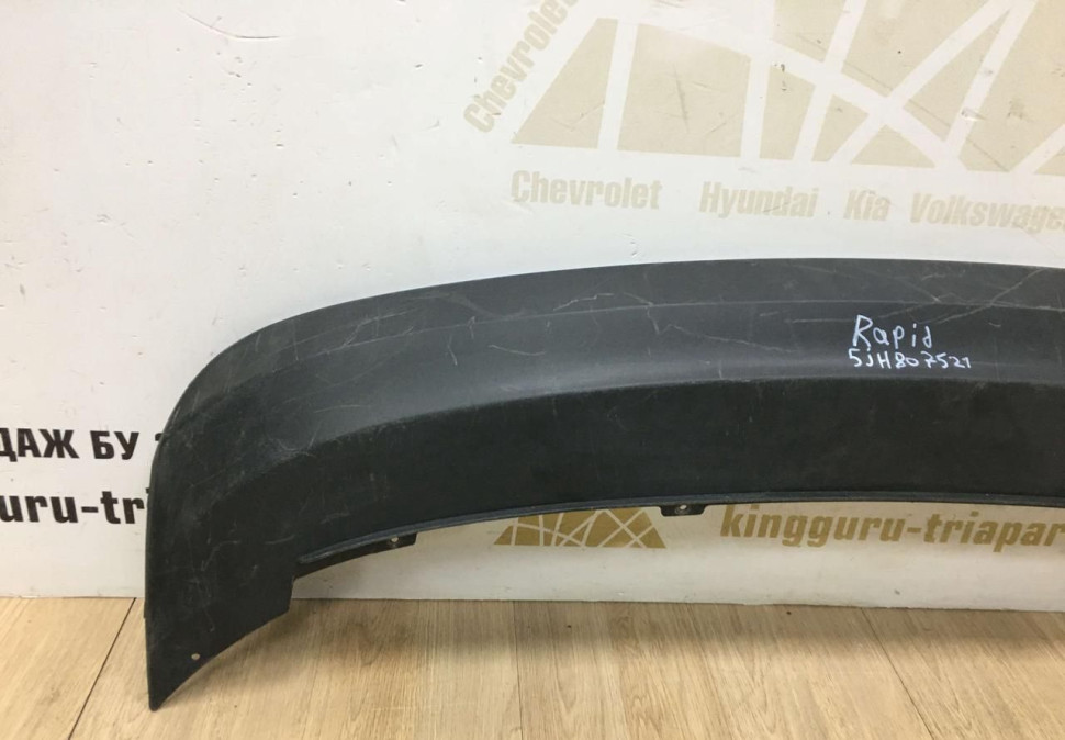 Спойлер заднего бампера Skoda Rapid 2013 OEM 5JH807521 Спойлер заднего бампера Skoda Rapid 2013 OEM 5JH807521
