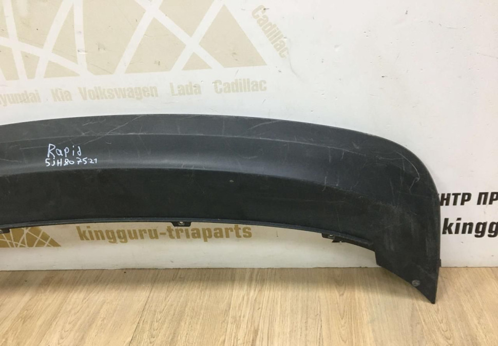 Спойлер заднего бампера Skoda Rapid 2013 OEM 5JH807521 Спойлер заднего бампера Skoda Rapid 2013 OEM 5JH807521