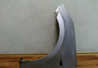 Крыло переднее левое Hyundai Solaris седан oem 663114L000 вмятина