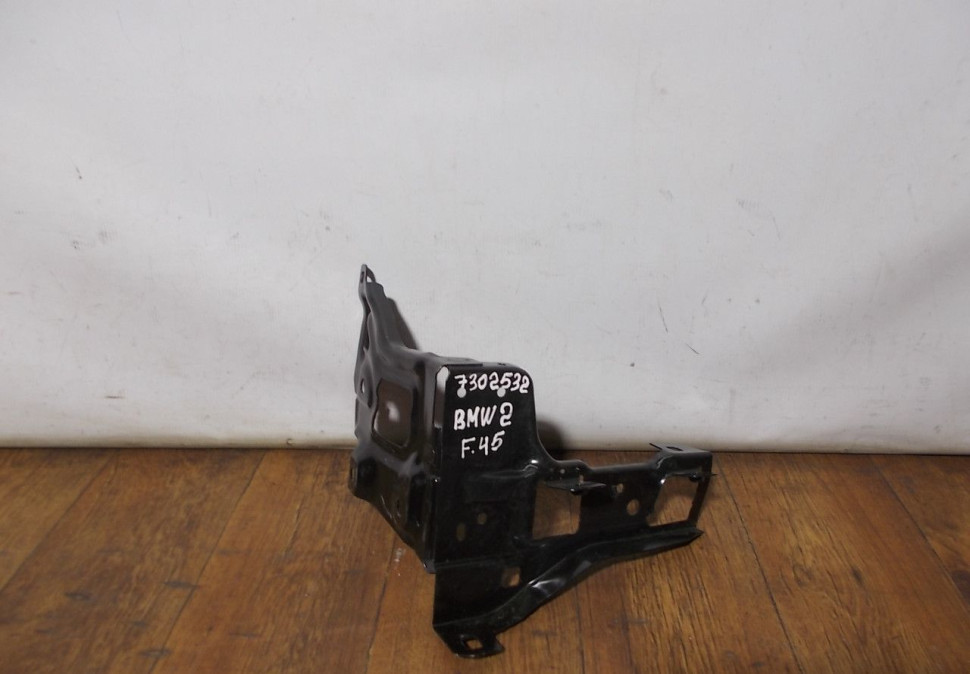 Кронштейн фары правый бу BMW 2 F45 OEM 7302532