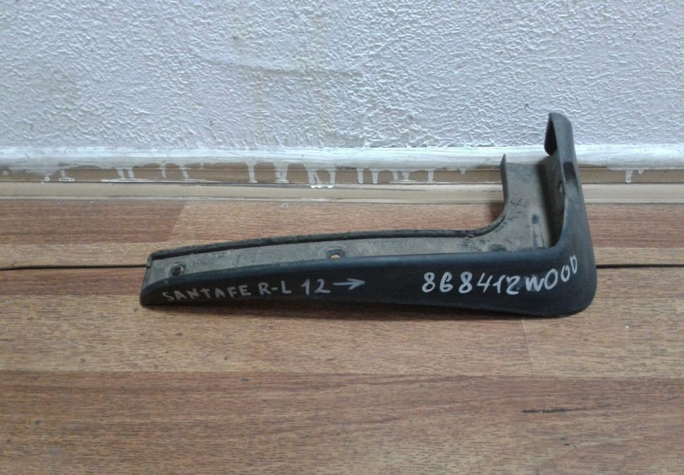 Брызговик задний левый Hyundai Santa Fe (12>) oem 868412w000 Брызговик задний левый Hyundai Santa Fe (12>) oem 868412w000