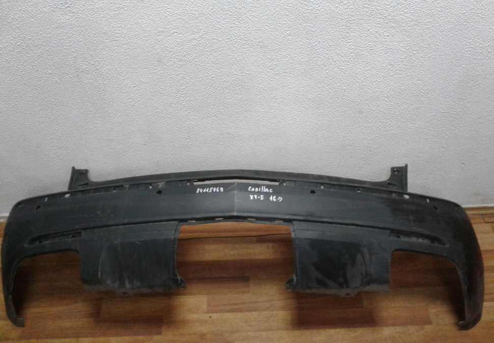 Бампер задний Cadillac XT5 (16>) oem 84115469
