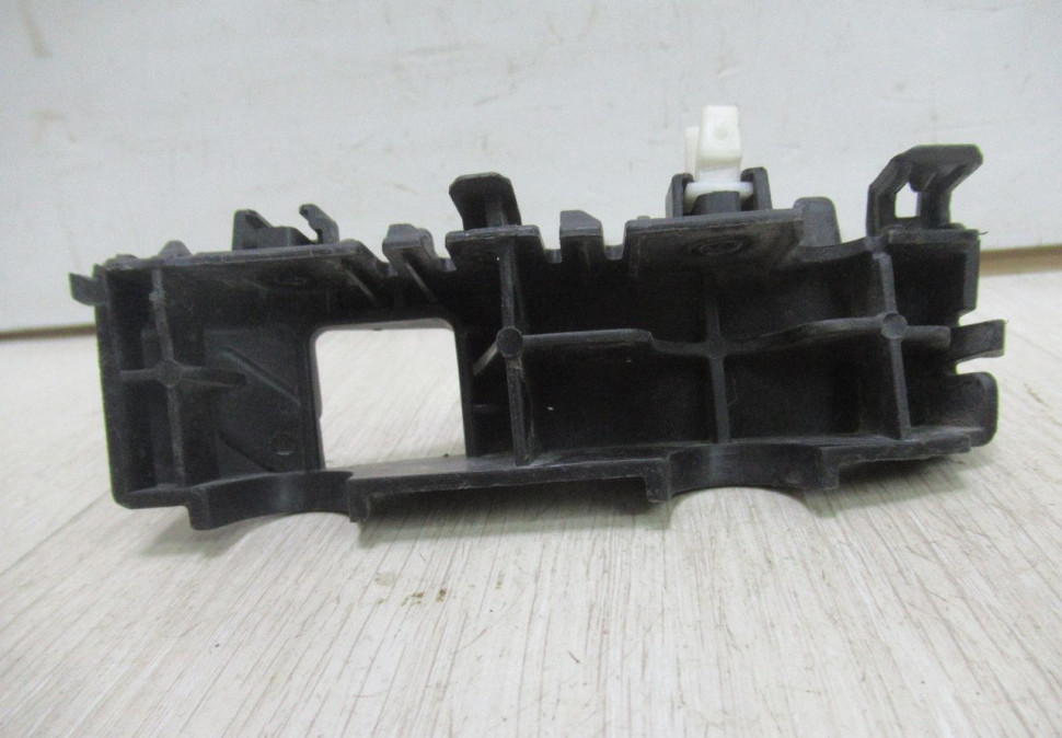 Кронштейн переднего бампера левый Hyundai Tucson 3 oem  86515d7000