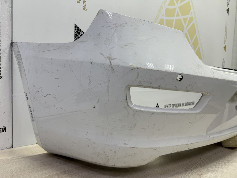 Бампер задний Chevrolet Cruze х/б oem 95494198 (вмятина) (скл-3) Бампер задний Chevrolet Cruze х/б oem 95494198 (вмятина) (скл-3)