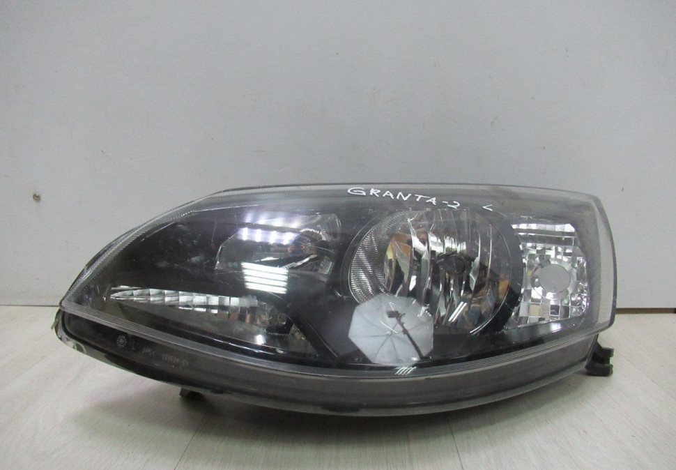 Фара левая Lada Kalina 2 (Слом.все крепл) (дефект на стекле) (скл-3) Фара левая Lada Kalina 2 (Слом.все крепл) (дефект на стекле) (скл-3)