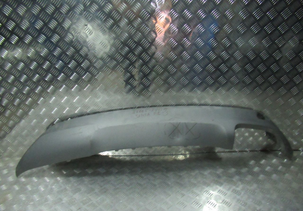 Спойлер заднего бампера Hyundai Santa Fe 3 15- oem 866652W510 (дефект)