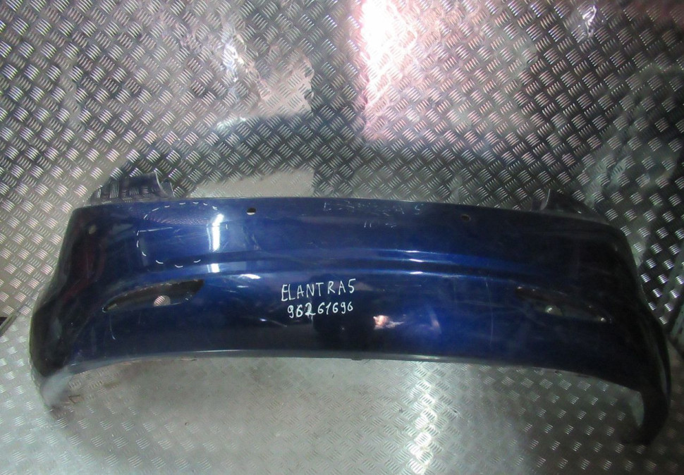 Бампер задний Hyundai Elantra 5 MD oem 866113x700 (слом.бок крепл) (скл-3)