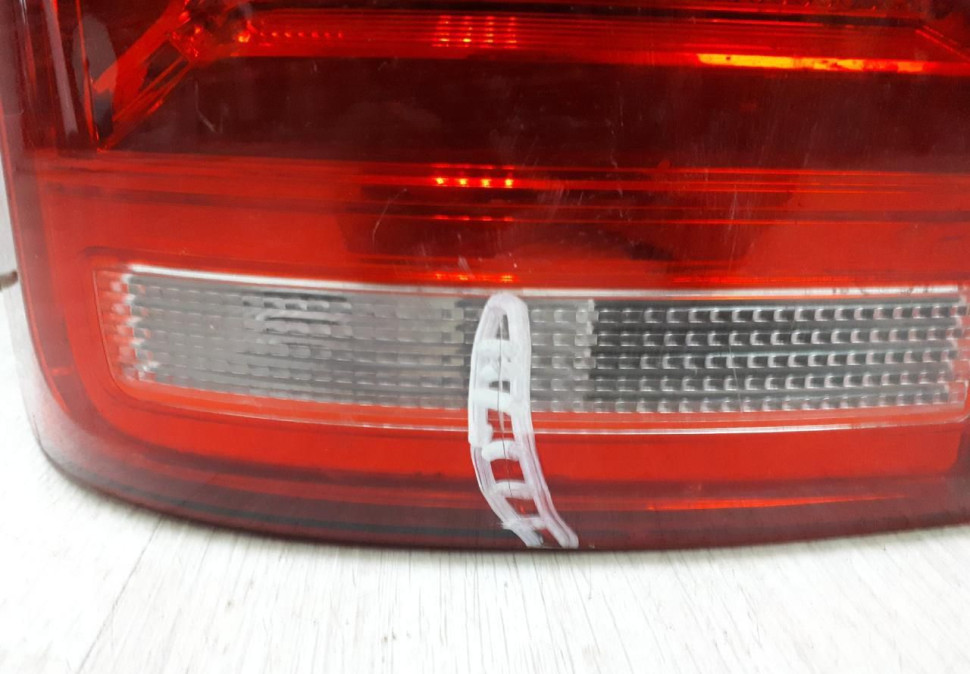 Фонарь левый Volkswagen Caravelle T6 (15>)  oem 7e0945207c