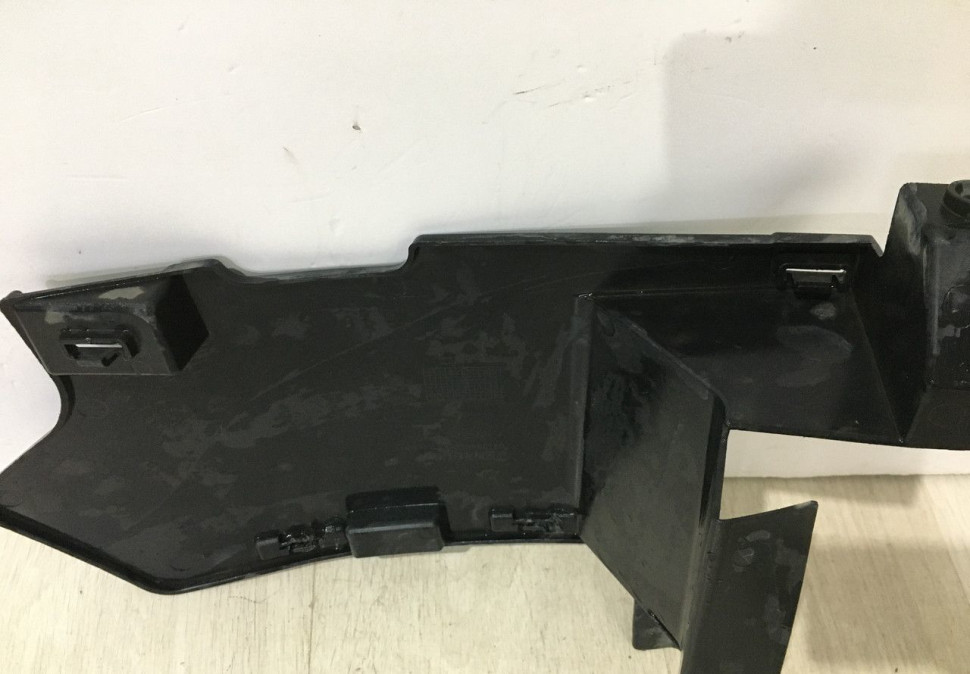 Дефлектор бампера левый Renault Logan 2 OEM 601986652R