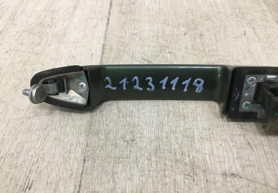 Ручка двери внешняя задняя левая Chevrolet Niva 2123 OEM 21231118 (скл-3) Ручка двери внешняя задняя левая Chevrolet Niva 2123 OEM 21231118 (скл-3)