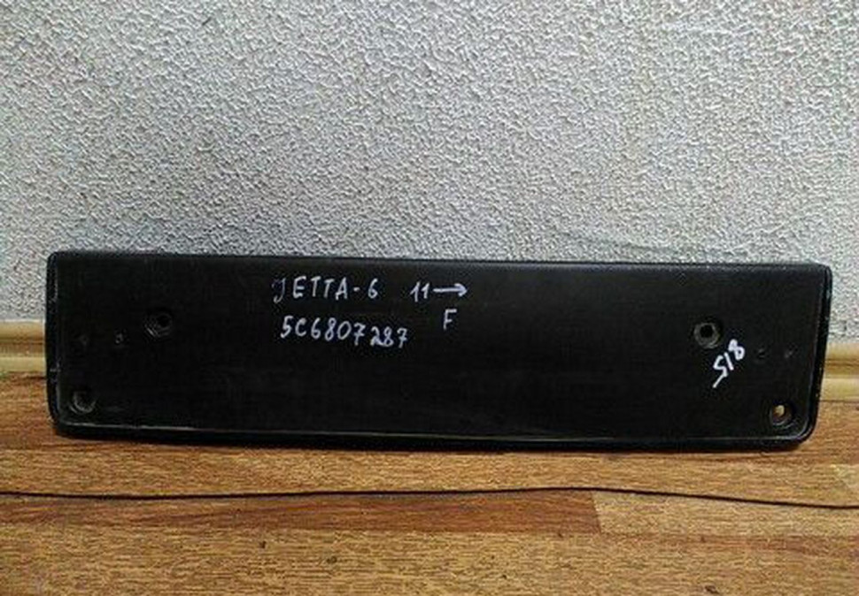 Подиум номерного знака передний Volkswagen Jetta 6 (11>) oem 5c6807287
