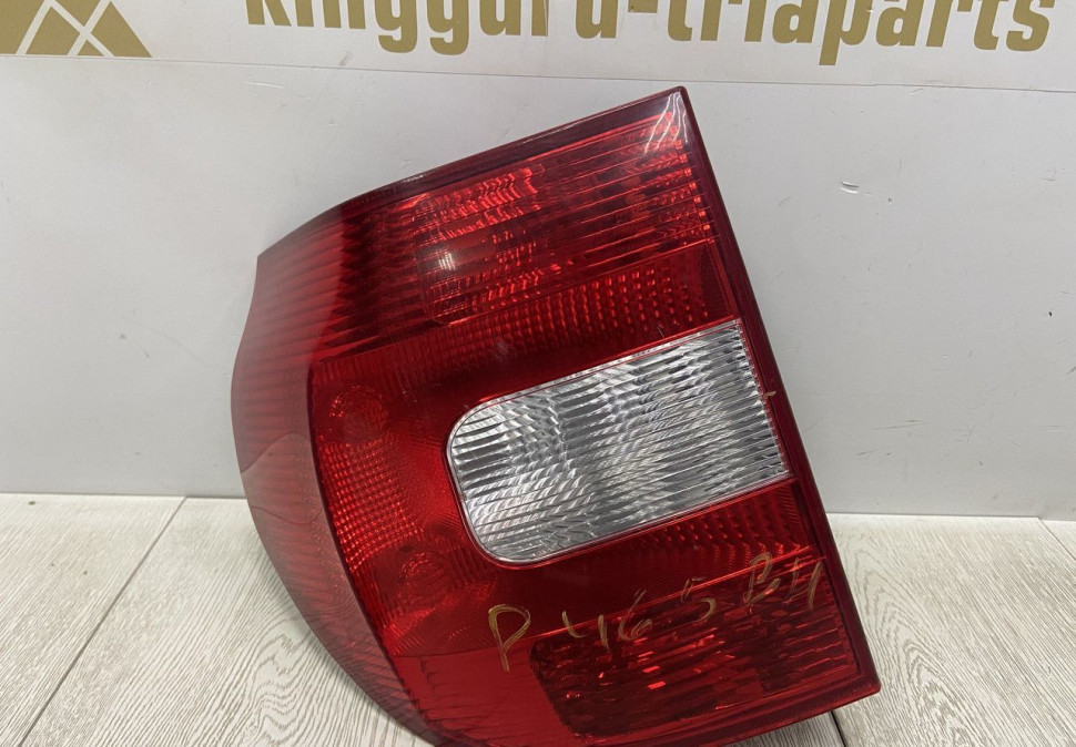 Фонарь левый Skoda Yeti до рестайлинг OEM 5L0945095