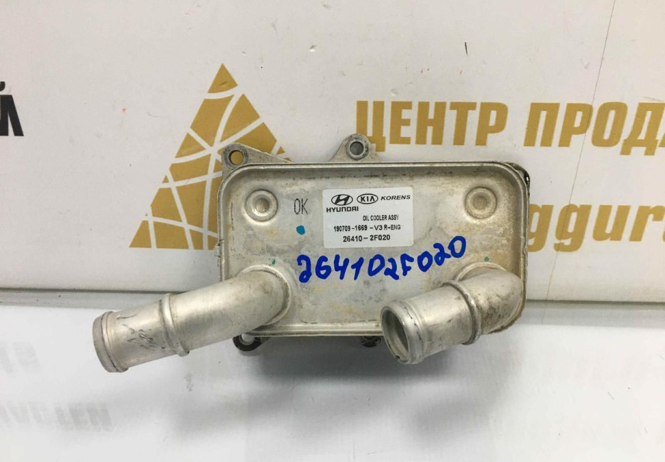 Маслянный радиатор Hyundai IX35 2010 OEM 264102F020