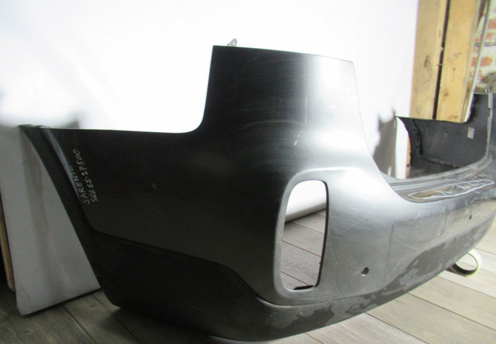 Бампер задний Kia Sorento 2 ХМ рест oem 866112P500 (вмятина)