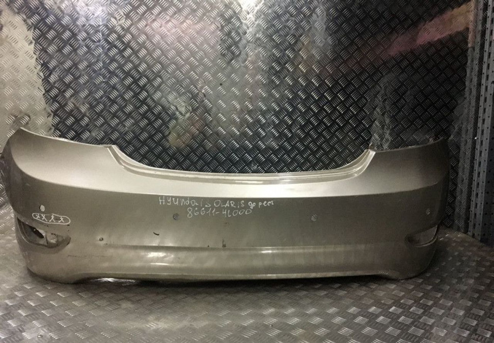 Бампер задний Hyundai Solaris 1 дорест oem  866114L000 (мал.вмятина)(мал.трещ на бок крепл)