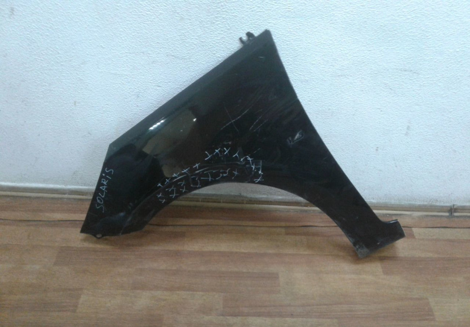 Крыло переднее левое Hyundai Solaris oem 663114L000 (вмятина)
