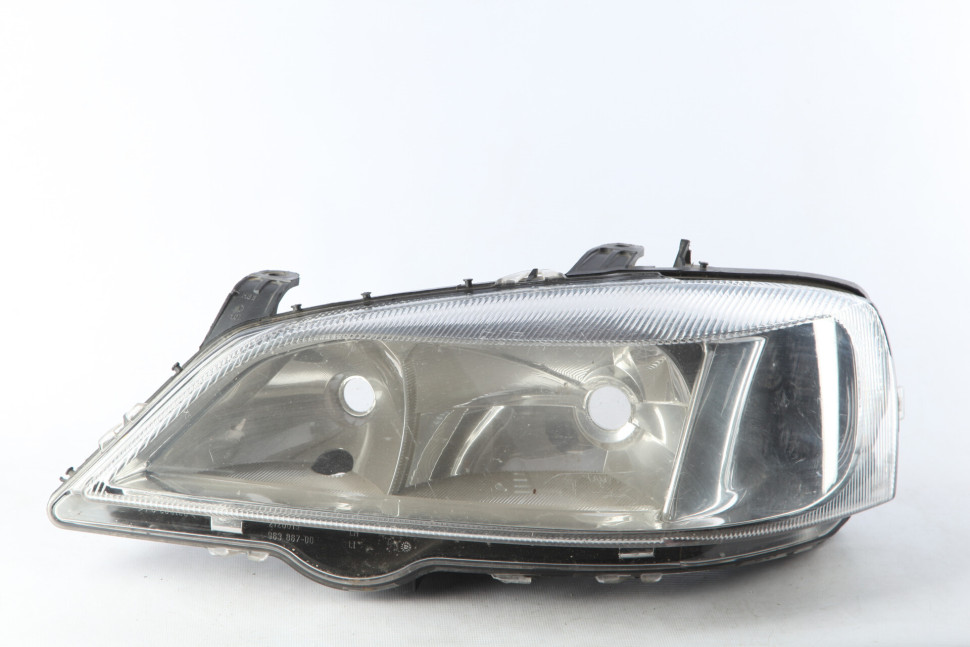 Фара левая Opel Astra G OEM 24439602