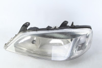 Фара левая Opel Astra G OEM 24439602