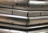 Решетка радиатора Cadillac Escalade 4 oem 23329115 (трещины) (слом.части)  (скл-3)