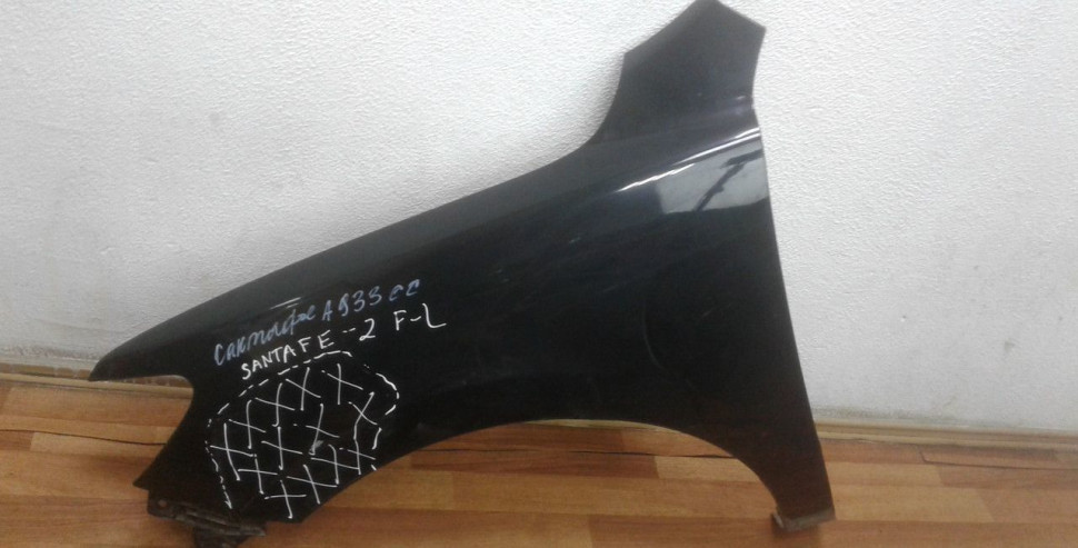 Крыло переднее левое Hyundai Santa Fe 2 oem 663100W260 (вмятина)