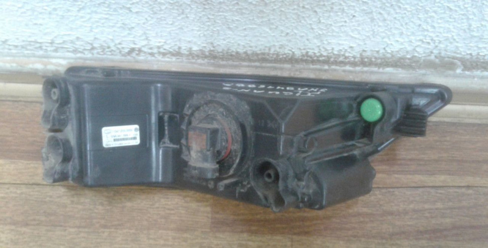 Фара птф левая Volkswagen Tiguan 2 oem 5na941699a (слом. 2 крепл.)