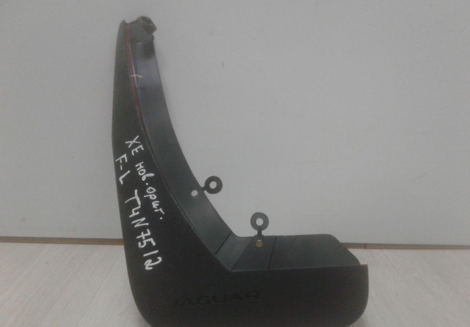 Брызговик передний левый Jaguar Xe oem t4n7512 (нов.ориг.)