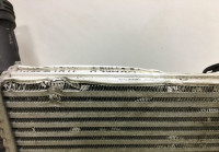 Интеркулер правый Volkswagen Touareg NF oem 7P0145804A (мал.вмятины)