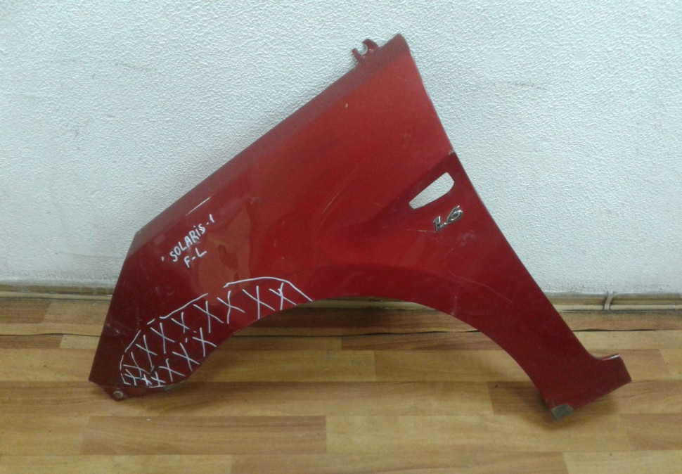 Крыло переднее левое Hyundai Solaris 1 oem 663114L000 (вмятина)