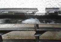 Решетка переднего бампера левая Volkswagen Touareg NF рестайл (после ремонта) oem 7p6853665