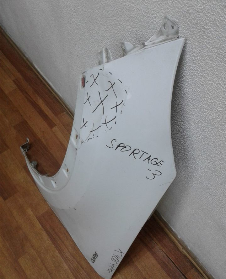 Крыло переднее левое Kia Sportage 3 (вмятина) (Скл-3) Крыло переднее левое Kia Sportage 3 (вмятина) (Скл-3)